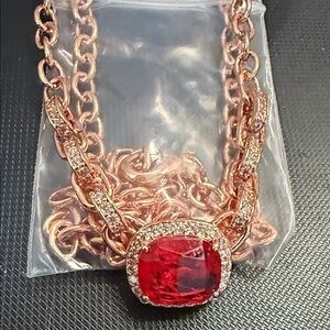 Radiant Rose Gold Necklace with Red Gemstone